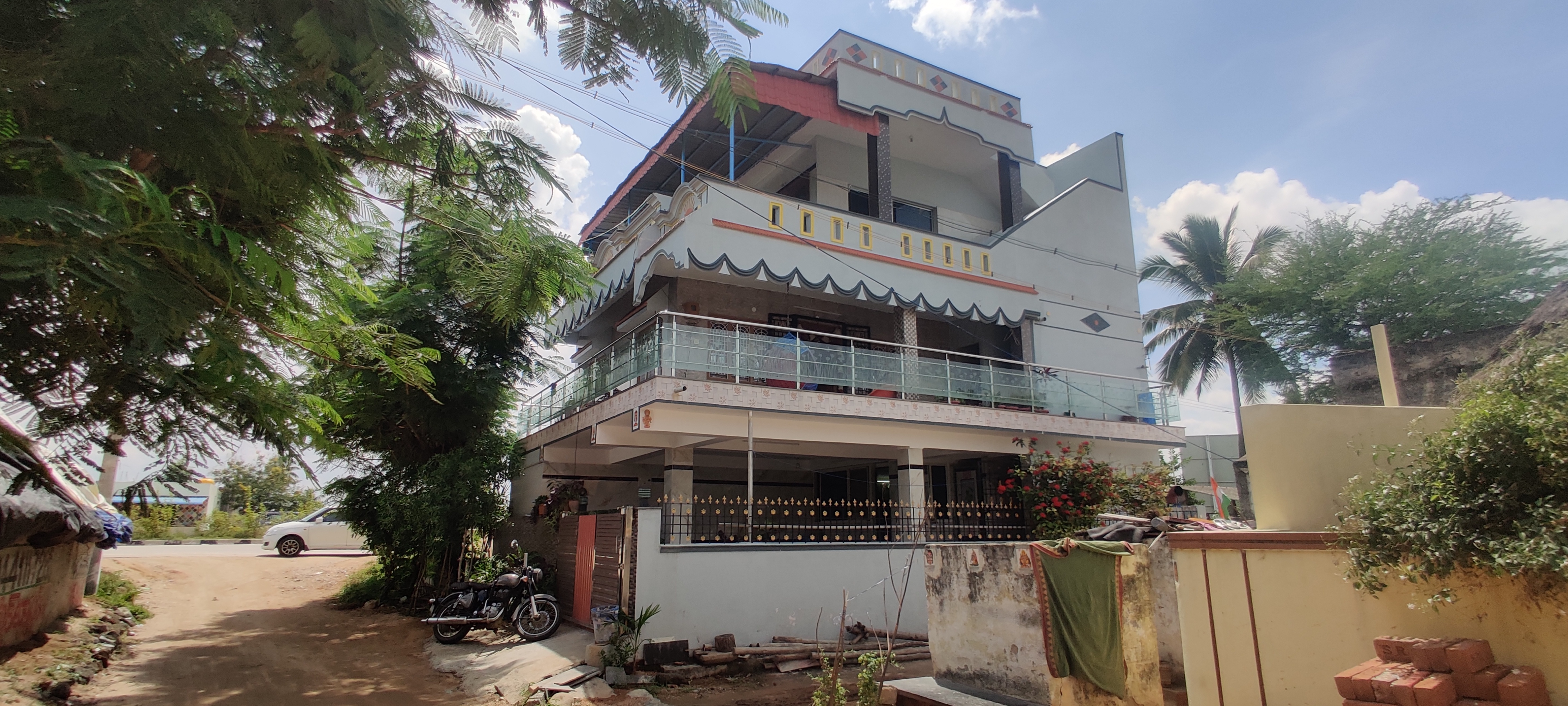 House Lifted 12.5 ft to Create Stilt Parking Beneath — Tirupati, Andhra Pradesh